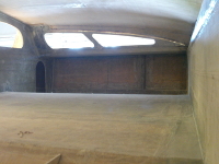 Cavernous saloon forward (before).